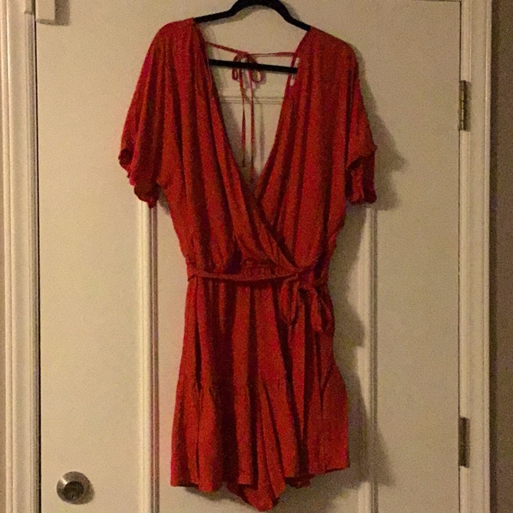 Flirty, comfy, red, ruffled romper.